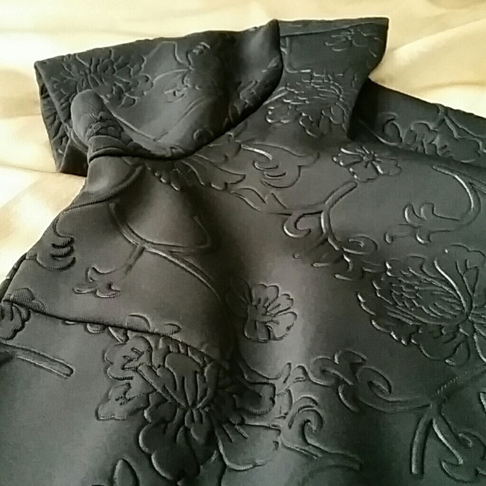 Black embossed dress